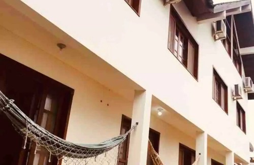 Barra de Ibiraquera Apartamento | Departamento con dos suites a dos cuadras del mar y tres cuadras de la laguna