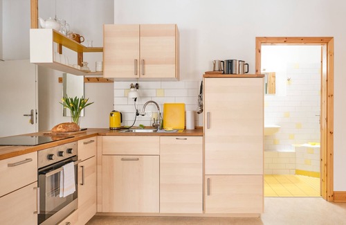Schwerin Apartamento | Apartamento amarillo - vacaciones en la granja orgánica