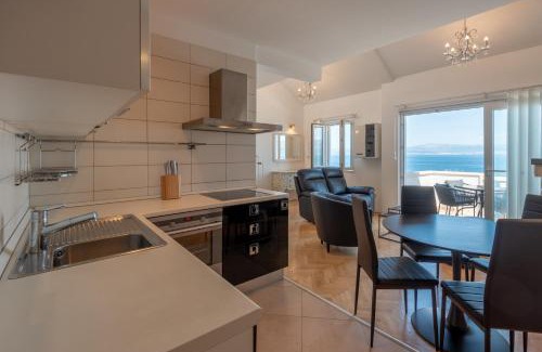 Sutivan Apartamento | APARTMENTS BRUNO 1&2 - two-room penthouse apartments - wonderful panoramic view of the sea - the best location, first row to the beach - 10 minutes from Supetar ferry port - free secured parking - facilities nearby