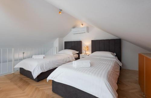 Sutivan Apartamento | APARTMENTS BRUNO 1&2 - two-room penthouse apartments - wonderful panoramic view of the sea - the best location, first row to the beach - 10 minutes from Supetar ferry port - free secured parking - facilities nearby