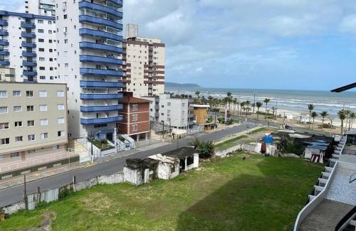 Vila Assuncao Apartamento | Ape aconchegante a 50m da Praia Tupi Wi-Fi, Smart TV e enxoval completo