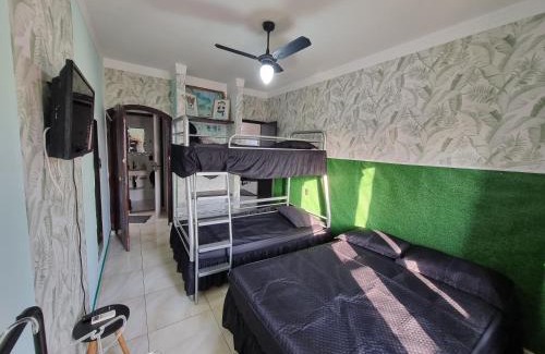 Pitangueiras Apartamento | ApMar 15a até 8 pessoas - Pitangueiras Guarujá - 2 minutos da praia - 2 quartos e 1 suíte com Ar Condicionado - 1 Vaga Garagem 24h - Próximo de mercados, bares, restaurantes