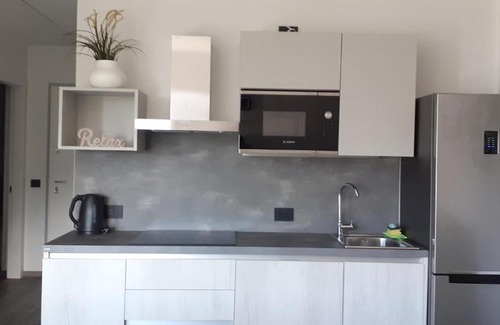 Campagnola Apartamento | APPARTAMENTO LECCINO