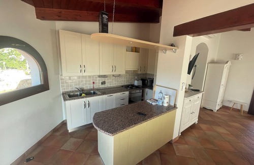San Teodoro Villa | 'Appartamento Runcina 1' con vistas al mar, Wi-Fi y piscina compartida