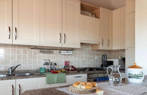 San Teodoro Villa | 'Appartamento Runcina 1' con vistas al mar, Wi-Fi y piscina compartida