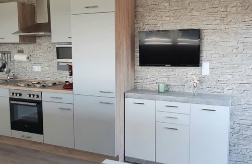 Buchlberg Apartamento | Appartement/fewo, Dusche, WC, Wohn-/schlafraum Nr1 - Gästehaus am Sonnenberg