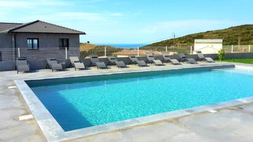 Olmeta-di-Tuda Apartamento | Appartement charmant à Olmeta di Tuda avec piscine partagée