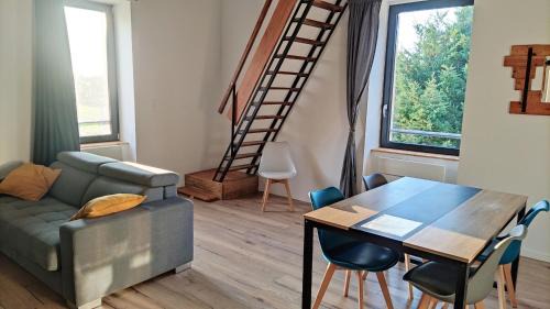 Beaupreau-en-Mauges Apartamento | Appartement duplex dans une ancienne usine