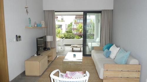 Mont Choisy Apartamento | Appartement Le Dauphin Du Lagon Bleu - Plages de Mont Choisy et de Trou aux Biches