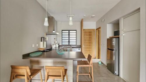 Mont Choisy Apartamento | Appartement Le Dauphin Du Lagon Bleu - Plages de Mont Choisy et de Trou aux Biches
