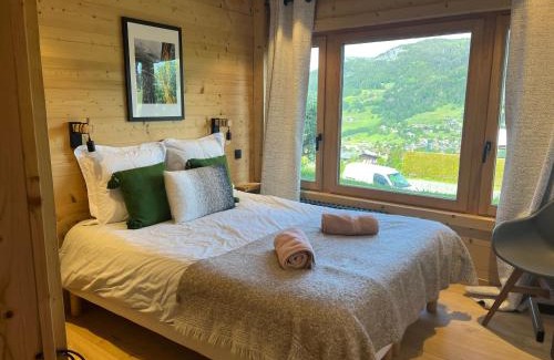 Le Planellet Apartamento | Appartement rez de jardin Megeve