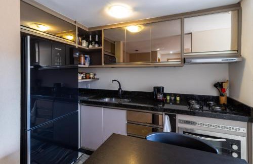 Garcia Apartamento | Apto a 10 min da Vila Germânica, dois quartos, salas de estar e jantar, cozinha completa, sacada com churrasqueira, Wi-Fi, Piscina, academia, mercadinho 24 horas e Vaga de garagem