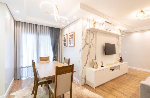 Nossa Senhora da Paz Apartamento | Apto a 150m DA PRAIA e 15min BETO CARREIRO com WI-FI, PISCINA, PORTARIA 24h, PLAYGROUND INFANTIL, QUADRA DE ESPORTES sacada com CHURRASQUEIRA e vaga de GARAGEM