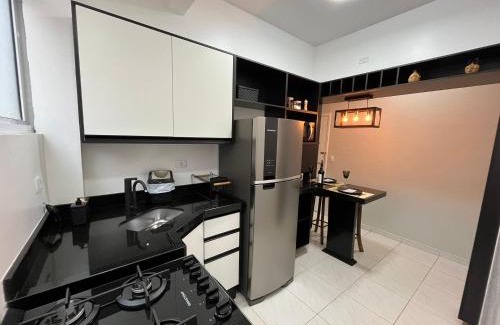 Boqueirao Apartamento | Apto com 2 varandas, vista para o mar e AC