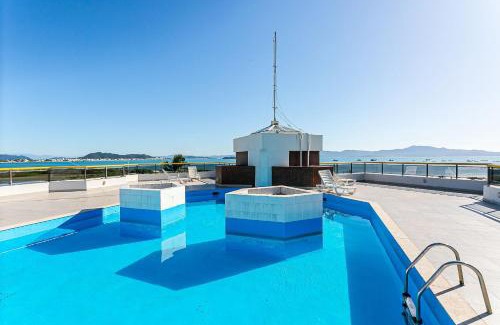 Ponta das Canas Apartamento | Apto com varanda e vista mar em Floripa | GVM133
