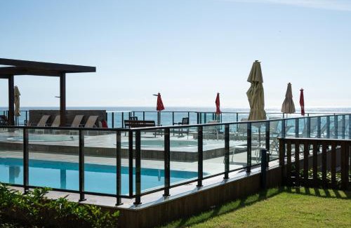 Barra Velha Apartamento | Apto completo com vista mar pé na areia em Barra Velha em condomínio Resort com Spa, Piscina, quadra de futebol, Sala de jogos, brinquedoteca, Complexo com diversos comércios