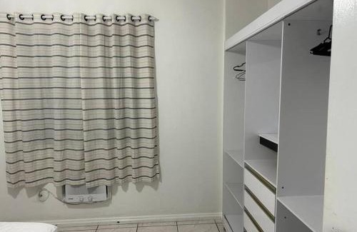 Asturias Apartamento | Apto confortável, Praia das Astúrias 5 min a pé, garagem, 2 quarto ar, suíte, wi-fi