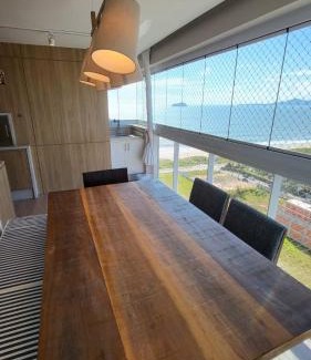 Itacolomi Apartamento | Apto de alto padrão/luxo em home club pé na areia com vista mar.