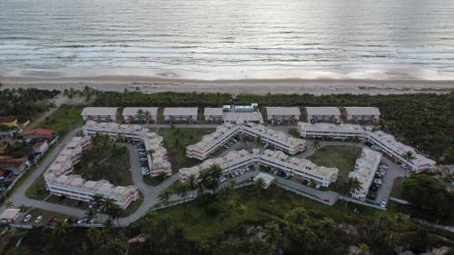 Aritagua Apartamento | Apto em condomínio na praia, com terraço, em Ilhéus-BA