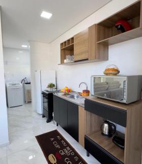 Piratuba Apartamento | Apto Girassol - 2 Quartos, Apto moderno,confortável e de frente para avenida principal!