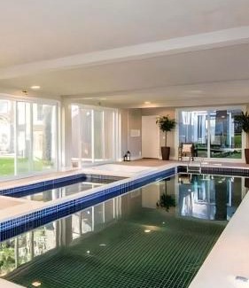 Carniel Apartamento | Apto Lindo e Completo com piscina e jacuzzi