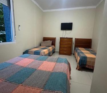 Pitangueiras Apartamento | Apto Natalino Broleze - Pé na areia