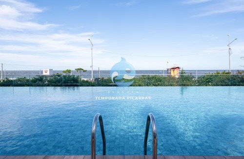 Itacolomi Apartamento | Apto Pé na Areia Condomínio Resort Completo com Piscina borda Infinita, Beach Tennis, Academia, Sala de Jogos, Brinquedoteca, Playground e Portaria 24H 2 Quartos com Ar-Condicionado, Churrasqueira Privativa Reserve Agora e Viva essa Experiência