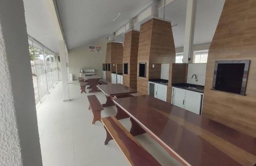 Guaratuba Apartamento | APTO TÉRREO a 50 Metros do MAR em Condomínio com PISCINAS MARAVILHOSAS