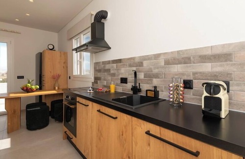 Adamas Apartamento | Aristotle Suites