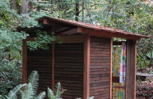 Geneva Casa | Artists Stone Cabin with Bath House, Sauna & Cedar Soaking Tub in Private Forest