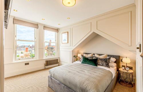 Queen's Park Apartamento | Astounding 4BR Haven with garden Queens Park Tube