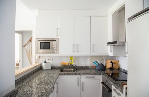 Poris de Abona Apartamento | A nivel del mar, y con vistas la playa. Apartamento con terraza y 8 hrs de sol