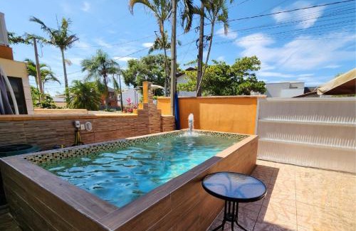 Pontal do Parana Casa | ATAMI STAY Casa em Condomínio com Piscina Aquecida a 1 Quadra do Mar