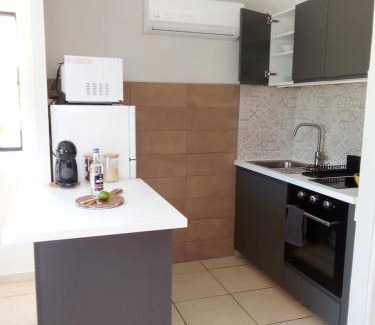 Bas du Fort Apartamento | Atoumo piscine citerne