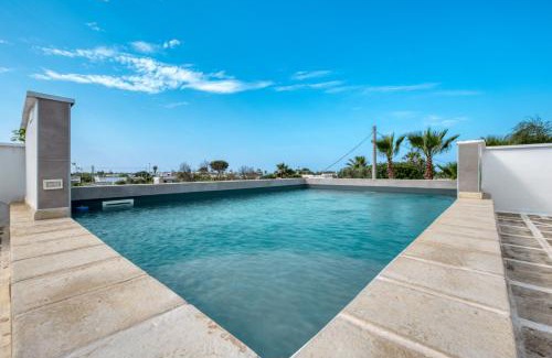 Marina di Mancaversa Apartamento | Attico Vinci con piscina