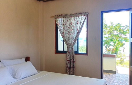 Port Barton Hotel | Ausan Beach Front Cottage and Restaurant