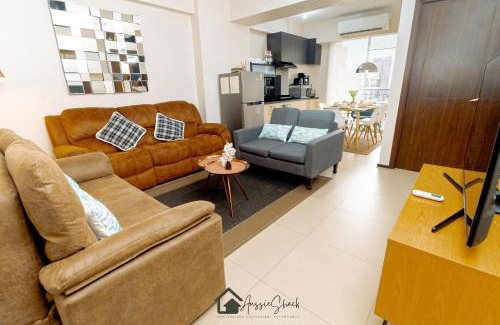 Bagumbayan Apartamento | Aussie Shack - 2BR Modern Condo with Skyline View