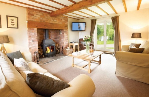 Westhide Cabaña | Pool Head Cottage es una acogedora escapada situada en Herefordshire, con vistas panorámicas.