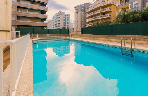 Daimuz Casa | AZUL - Coqueto apartamento con piscina compartida y Wifi gratis