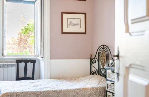 Ameal Casa | B&B Quarto Violeta com Chaminé