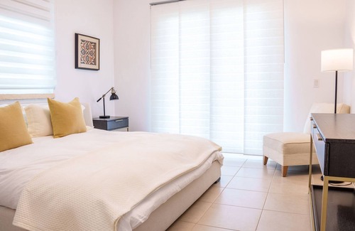 Herreras Condominio | Bahia Beach Ground Level 3BDRM- Sophisticated Villa Serena