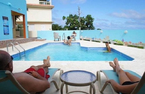Ensenada Apartamento | Balcony, Partial View, Pool, Laundry, Unit D