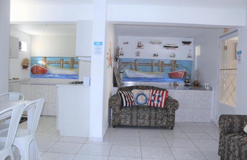 Ensenada Apartamento | Balcony, Partial View, Pool, Laundry, Unit D