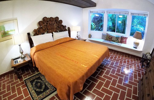 Adolfo López Mateos Cama Y Desayuno | Baldwin's Guest House Cozumel