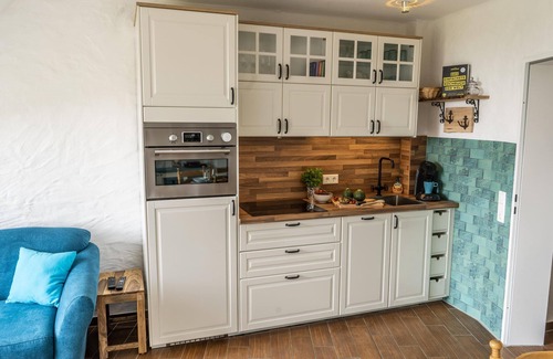 Kronsgaard Apartamento | Baltic Sea view - 1st floor, balcony, shower, washing machine, swimming pool, infrared cabin