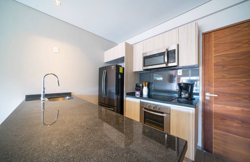 Playacar Apartamento | Bamoa - Luxury condo at Playacar Fase II