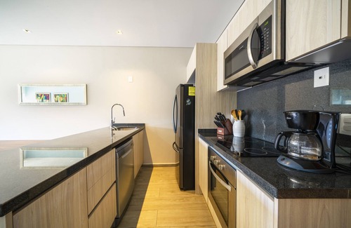 Playacar Apartamento | Bamoa - Luxury condo at Playacar Fase II
