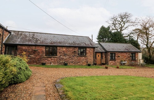 Brushford Cabaña | BARN OWL, pet friendly, with a garden in Dulverton