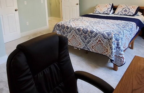 Williston North Condominio | Basement Space with bedroom, living room, movie theatre and gym.
