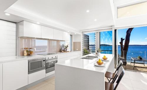 Corlette Apartamento | Baydream on the Beach - With Breathtaking Water Views